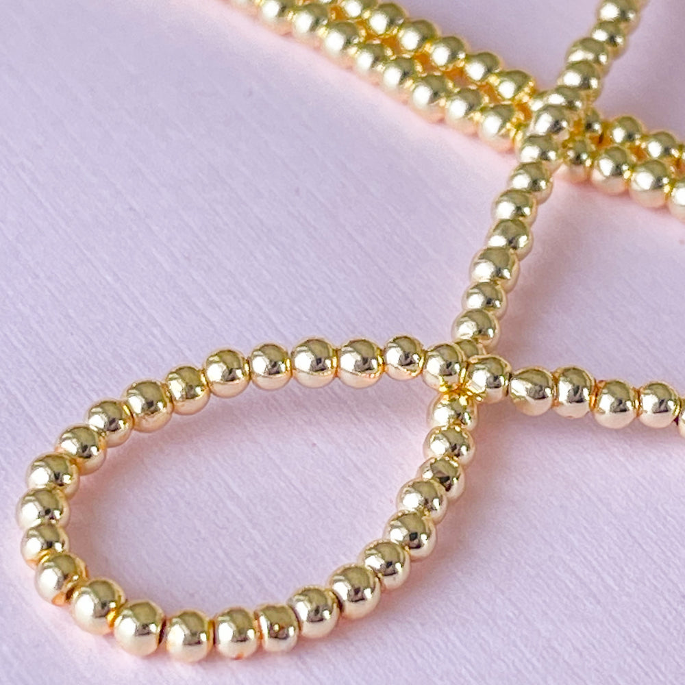 
                
                    Load image into Gallery viewer, 2mm Gold Hematite Rounds Strand
                
            