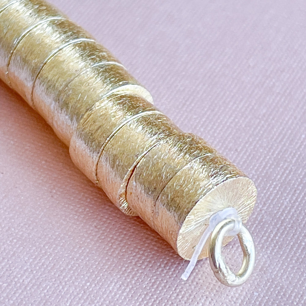 
                
                    Load image into Gallery viewer, 10mm Brushed Gold Short Cylinder Strand
                
            