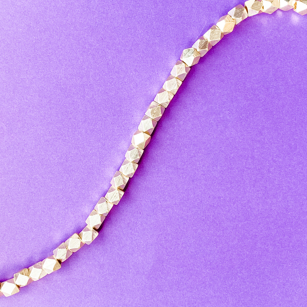 7mm Gold Faceted Nugget Strand