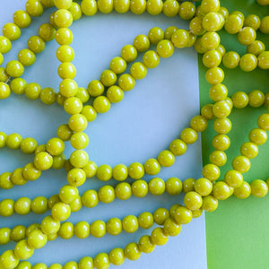
                
                    Load image into Gallery viewer, 8mm Chartreuse Green Jade Rounds Strand
                
            