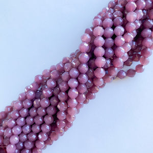 
                
                    Load image into Gallery viewer, 8mm Fancy Helix Cut Purple Crystal Rounds Strand
                
            