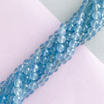 8mm Faceted Translucent Sky Blue Dyed Jade Rounds Strand