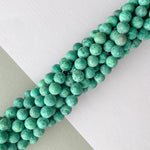 8mm Matte Pine Spotted Jade Rounds Strand
