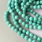 8mm Matte Pine Spotted Jade Rounds Strand