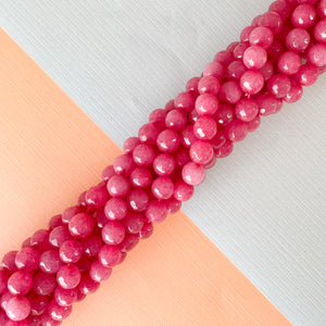 
                
                    Load image into Gallery viewer, 8mm Faceted Berry Dyed Jade Rounds Strand
                
            