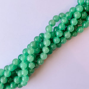 
                
                    Load image into Gallery viewer, 10mm Shiny Aventurine Round Stand
                
            
