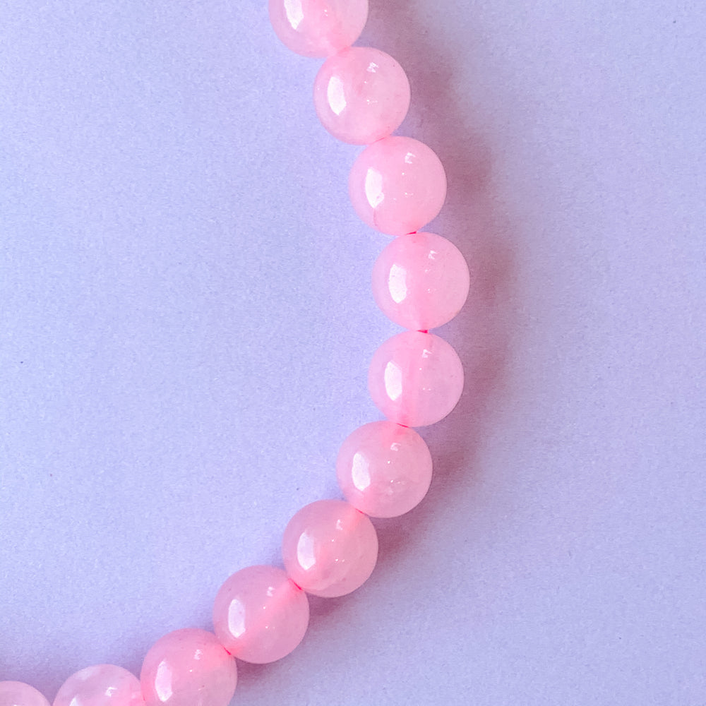 
                
                    Load image into Gallery viewer, 8mm Shiny Rose Quartz Round Stand
                
            