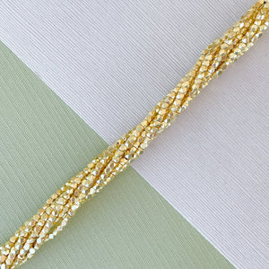
                
                    Load image into Gallery viewer, 2mm Gold Faceted Nugget Strand
                
            