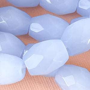 
                
                    Load image into Gallery viewer, 13mm Periwinkle Faceted Glass Barrel Strand
                
            