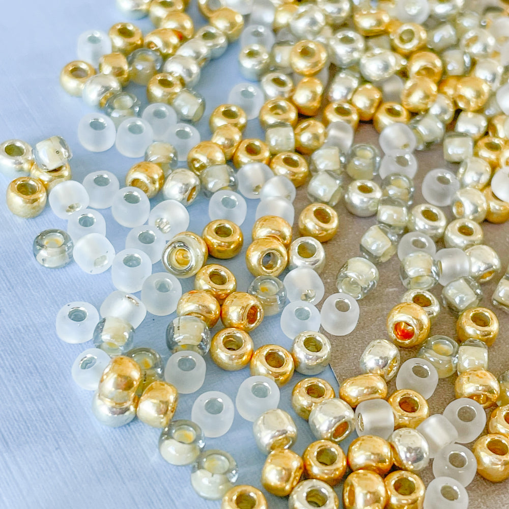 
                
                    Load image into Gallery viewer, 4mm Champagne Multicolor Seed Bead Pack
                
            