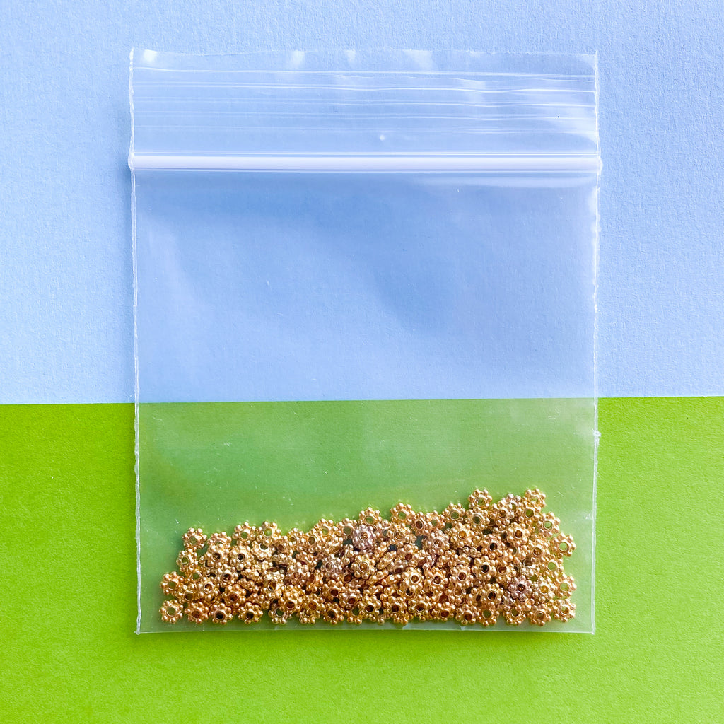 4mm Gold Daisy Disc Spacer Pack Beads, Inc.