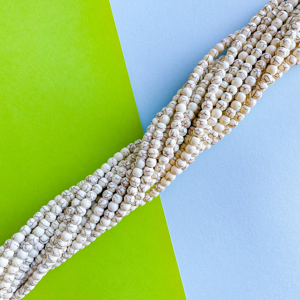 6mm Cream Magnesite Rounds Strand - Beads, Inc.