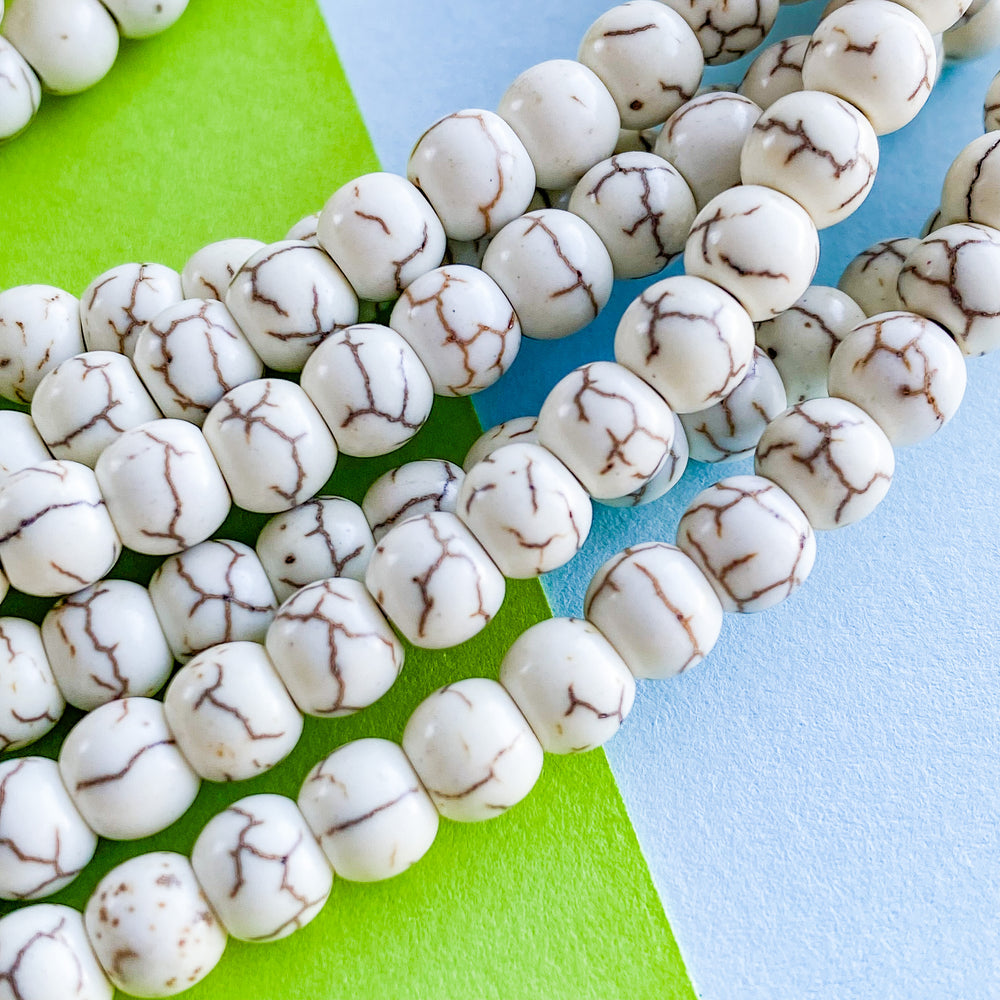 6mm Cream Magnesite Rounds Strand - Beads, Inc.