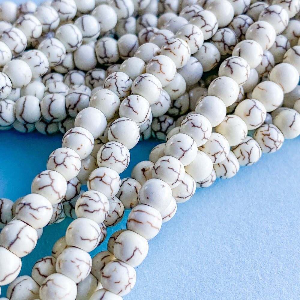 6mm Cream Magnesite Rounds Strand - Beads, Inc.