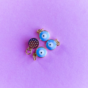 
                
                    Load image into Gallery viewer, 8mm Aqua + White Enamel Evil Eye Gold Plated Charm
                
            
