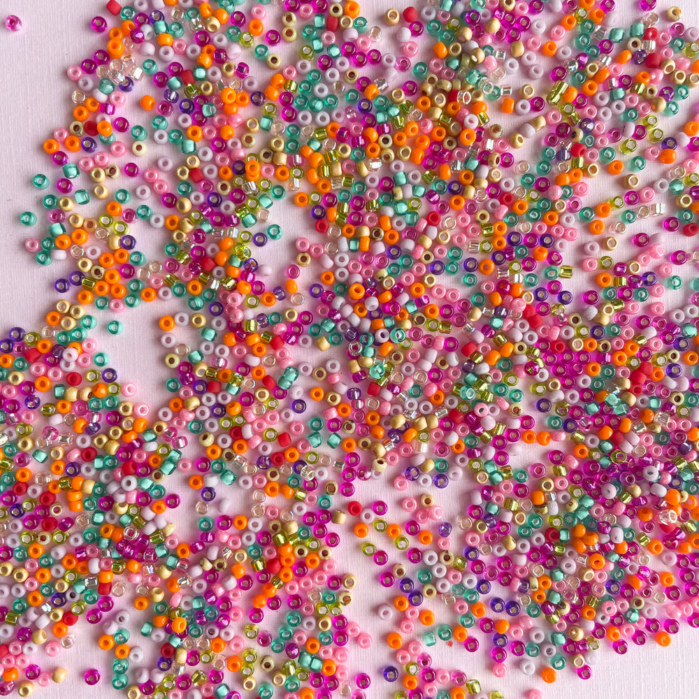 
                
                    Load image into Gallery viewer, 2mm Bloom Multicolor Seed Bead Pack
                
            