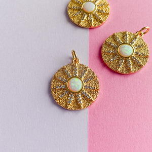 
                
                    Load image into Gallery viewer, 18mm Gold And Opal Pave Sunburst Coin Charm
                
            