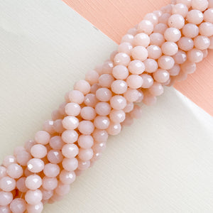 
                
                    Load image into Gallery viewer, 8mm Peachy Pink Faceted Chinese Crystal Rondelle Strand
                
            
