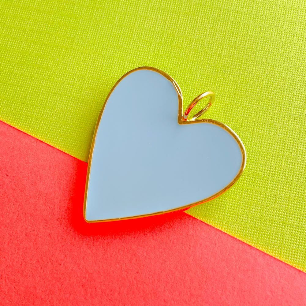 
                
                    Load image into Gallery viewer, 32mm Light Blue Enamel Gold Heart Pendant
                
            