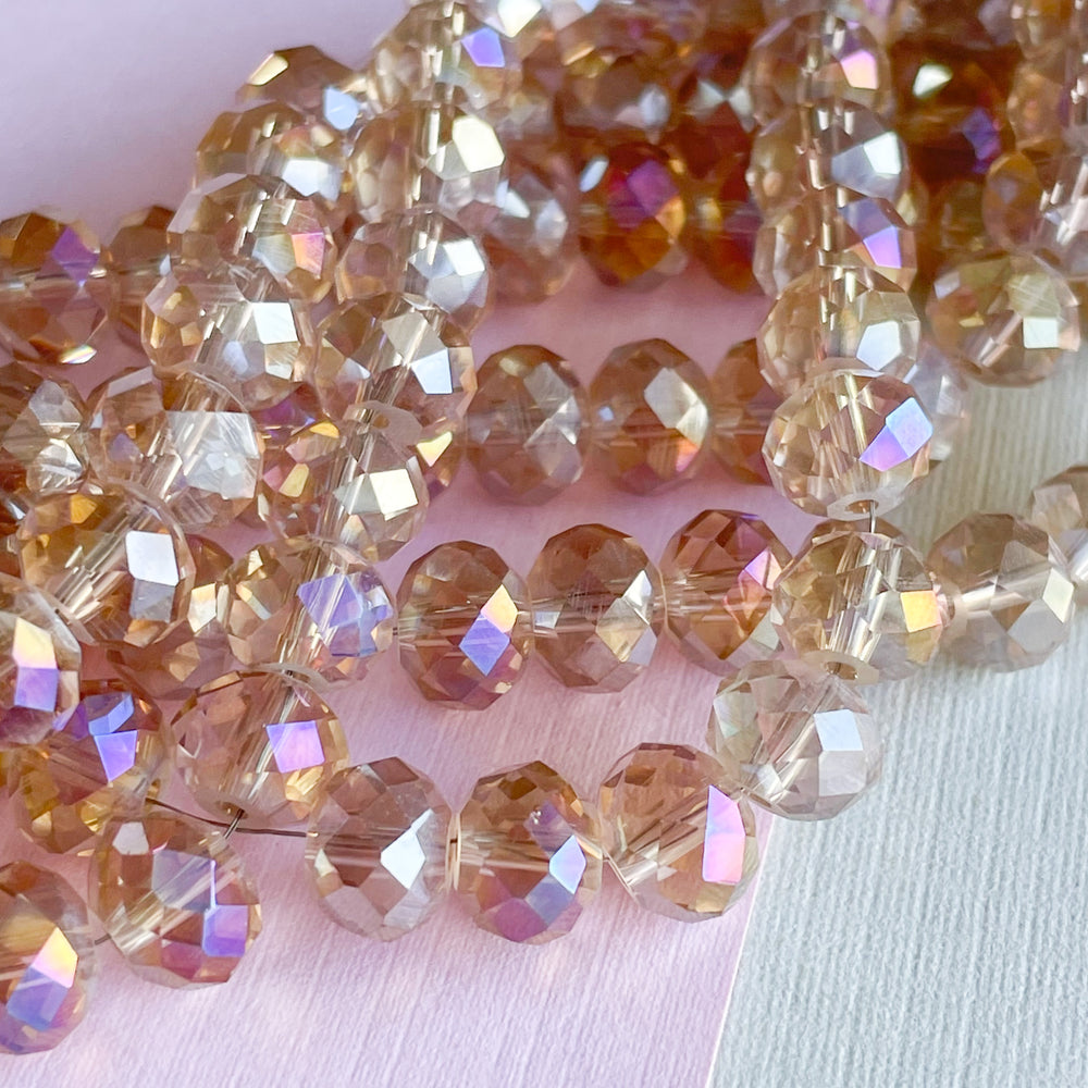 
                
                    Load image into Gallery viewer, 8mm Champagne AB Finish Faceted Chinese Crystal Rondelle Strand
                
            