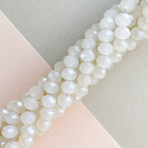 
                
                    Load image into Gallery viewer, 8mm Opalite Faceted Chinese Crystal Rondelle Strand
                
            