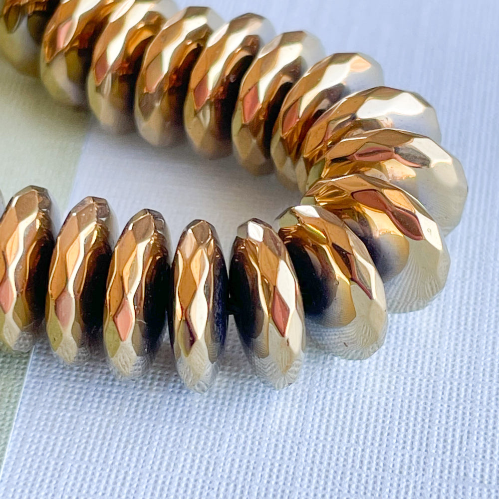 11mm Faceted Gold Hematite Rondelle Strand