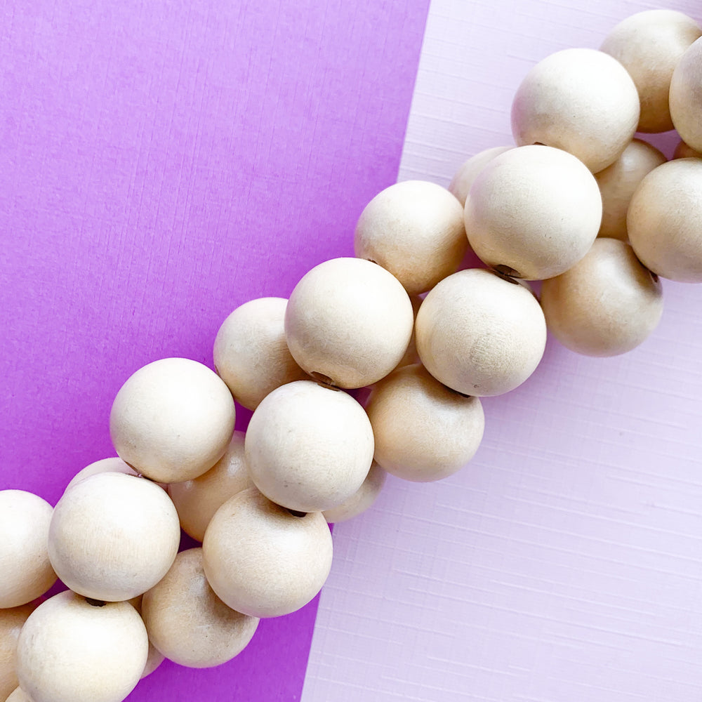 20mm Beige Wood Rounds Strand - Beads, Inc.