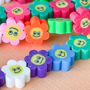 
                
                    Load image into Gallery viewer, 10mm Multicolor Flowery Smiley Polymer Strand
                
            