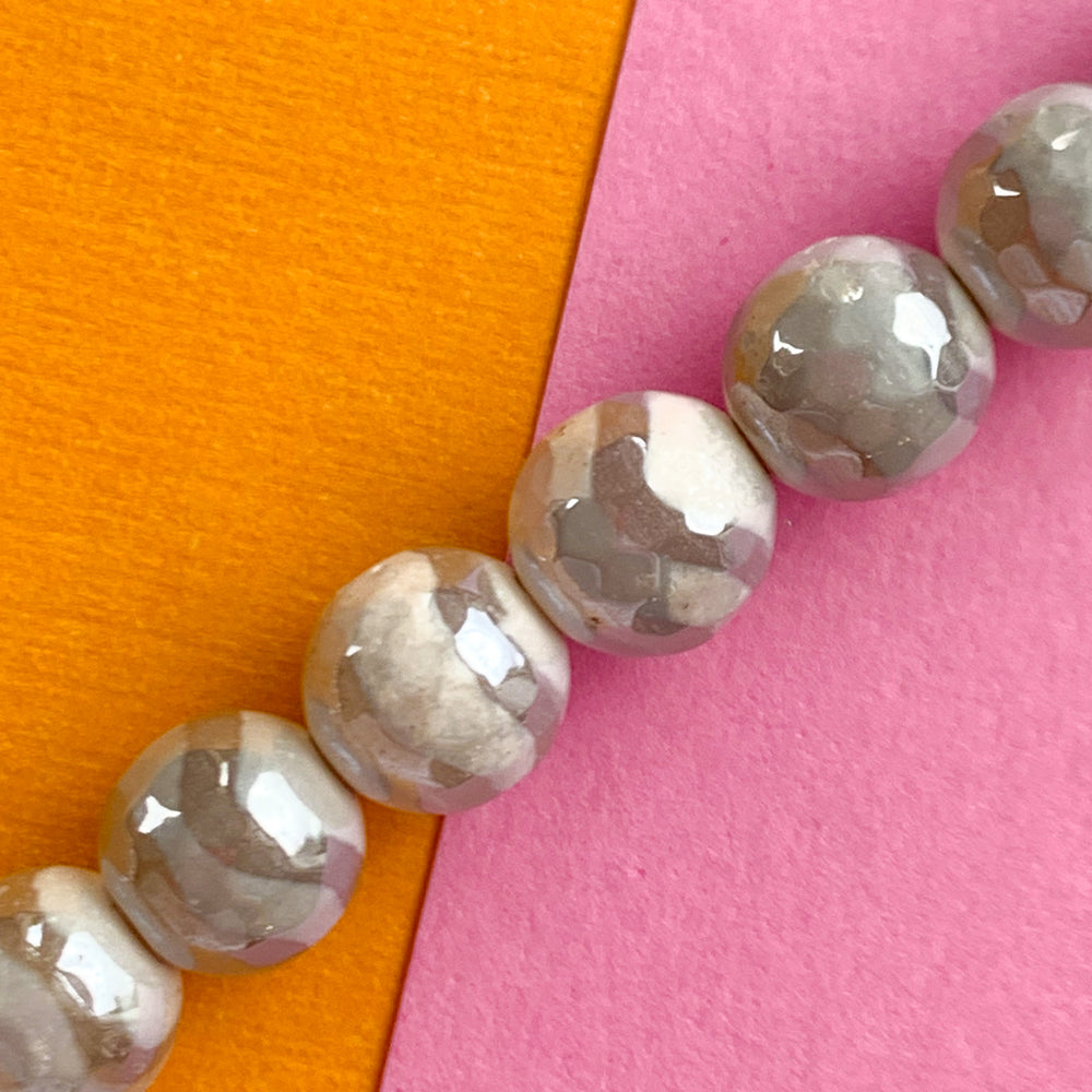 
                
                    Load image into Gallery viewer, 8mm Faceted Diamond Finish White DZI Agate Rounds Strand
                
            