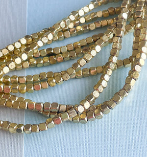 3mm Gold Faceted Brass Cube Strand