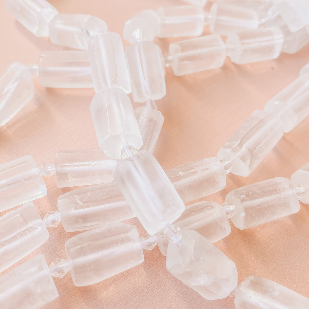 10mm Faceted Barrel Clear Quartz Strand