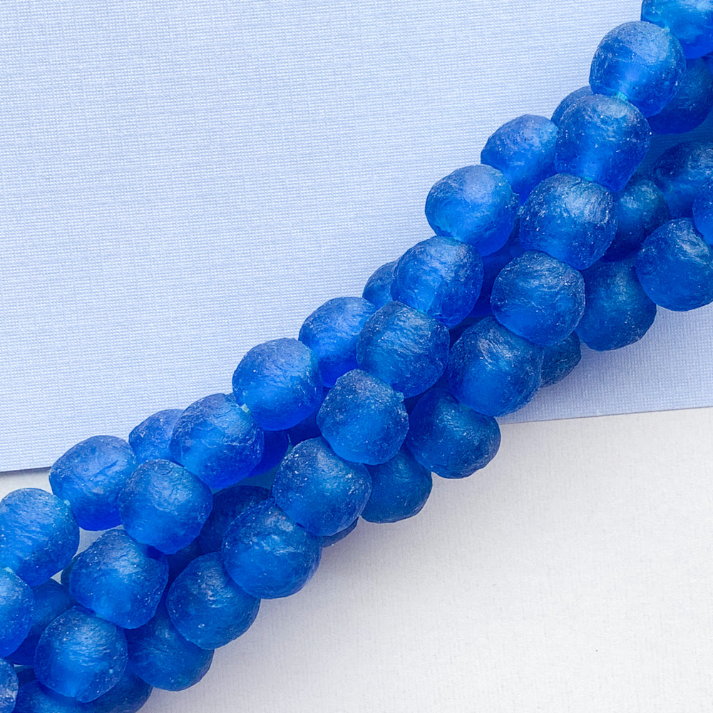 
                
                    Load image into Gallery viewer, 13mm Cobalt Recycled African Glass Strand
                
            