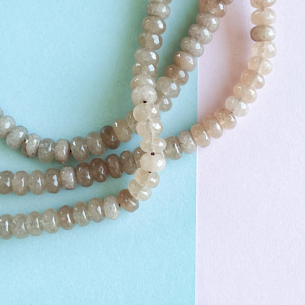 
                
                    Load image into Gallery viewer, 8mm Light Fig Dyed Jade Faceted Rondelle Strand
                
            