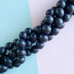 16mm Midnight Wood Rounds Strand