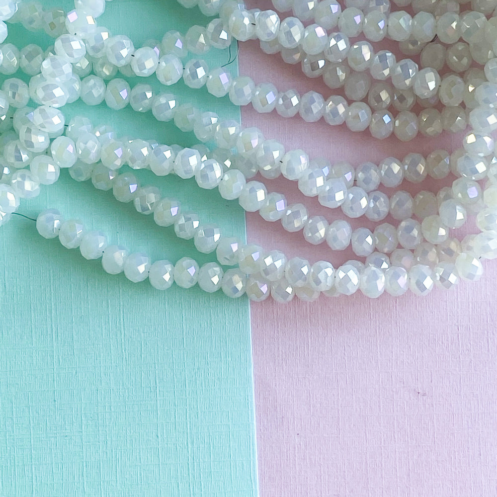 6mm Diamond Finish Opaque White Crystal Rondelle Strand