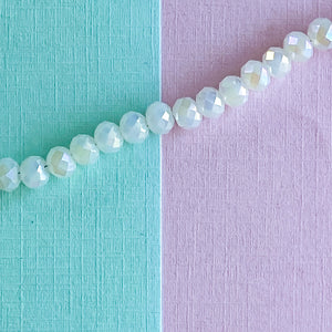 6mm Diamond Finish Opaque White Crystal Rondelle Strand