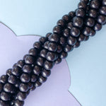 8mm Midnight Wood Rounds Strand
