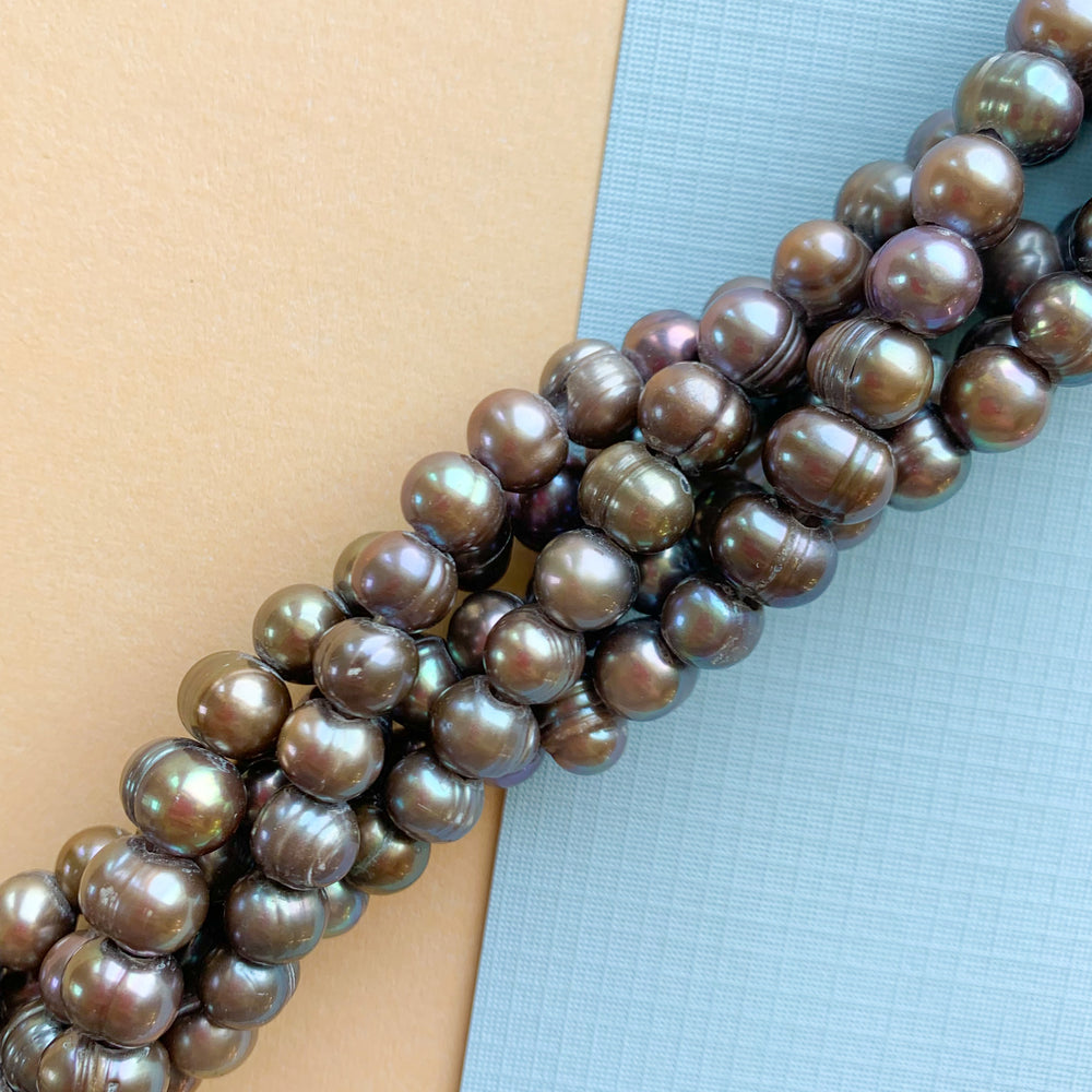 
                
                    Load image into Gallery viewer, 9mm Cappuccino Large Hole Freshwater Pearl Strand
                
            