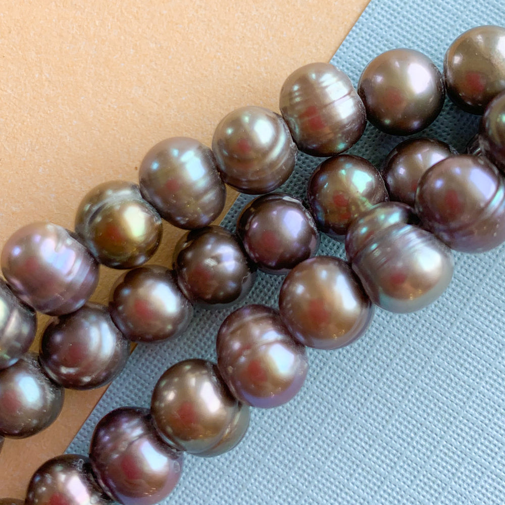 
                
                    Load image into Gallery viewer, 9mm Cappuccino Large Hole Freshwater Pearl Strand
                
            
