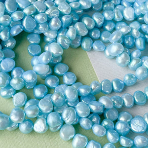 
                
                    Load image into Gallery viewer, 6mm Sky Blue Freshwater Potato Pearl Strand
                
            