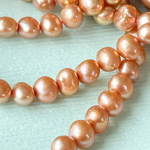 
                
                    Load image into Gallery viewer, 4mm Caramel Freshwater Pearl Rounds Strand
                
            