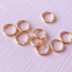 
                
                    Load image into Gallery viewer, 6mm Shiny Gold Filled Double Split Jump Ring - 10 Pack
                
            