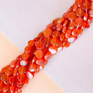 
                
                    Load image into Gallery viewer, 7mm Carnelian Organic Coin Strand
                
            