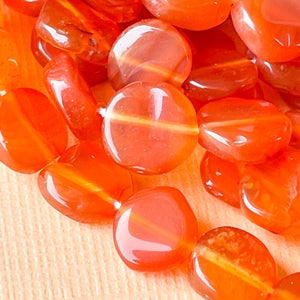 
                
                    Load image into Gallery viewer, 7mm Carnelian Organic Coin Strand
                
            