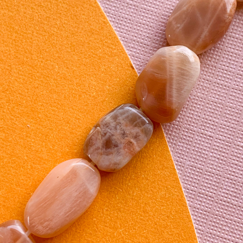 
                
                    Load image into Gallery viewer, 6mm Smooth Sunstone Nugget Strand
                
            