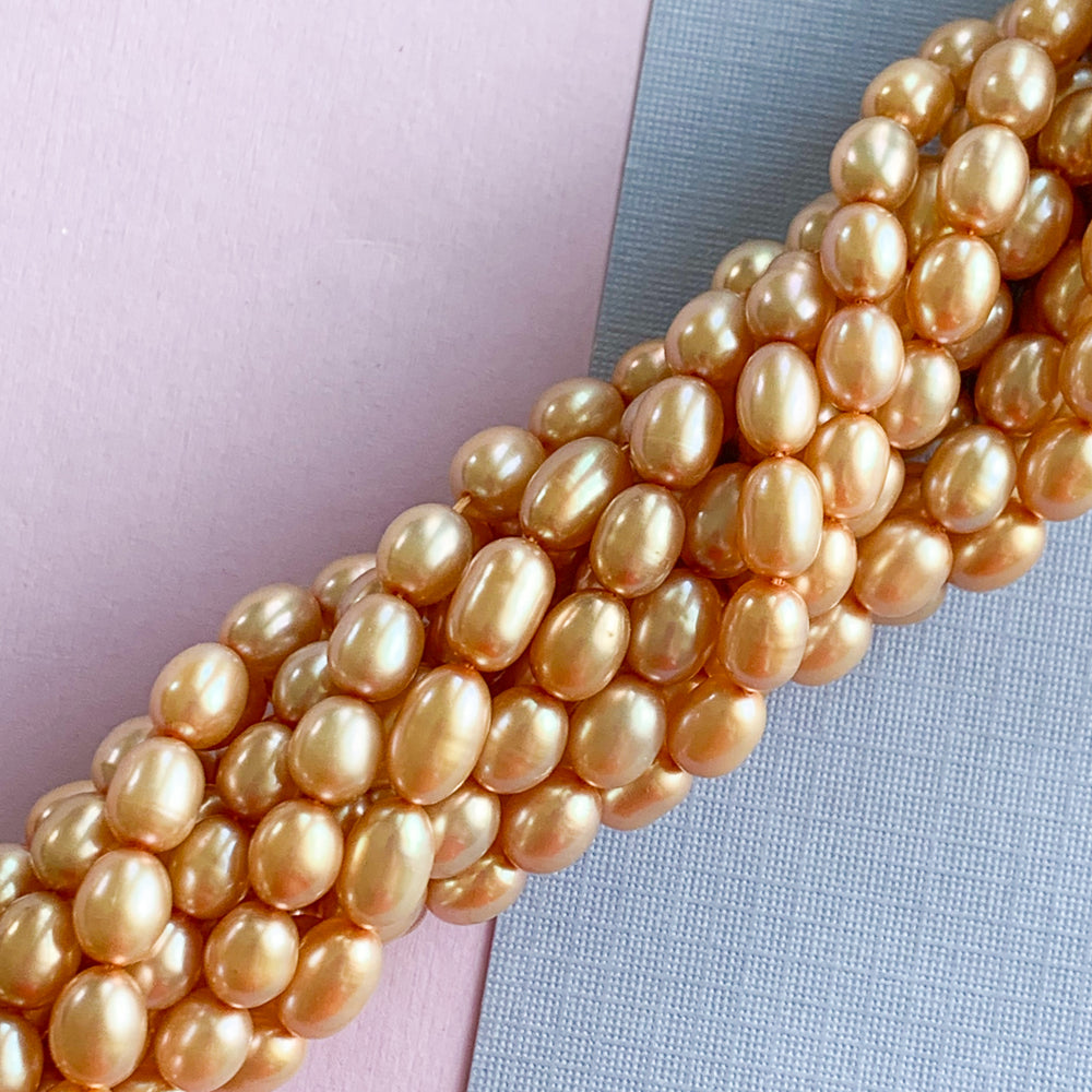 
                
                    Load image into Gallery viewer, 6mm Champagne Freshwater Rice Pearl Strand
                
            