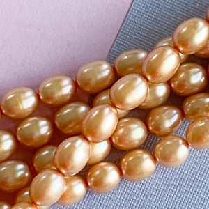 
                
                    Load image into Gallery viewer, 6mm Champagne Freshwater Rice Pearl Strand
                
            