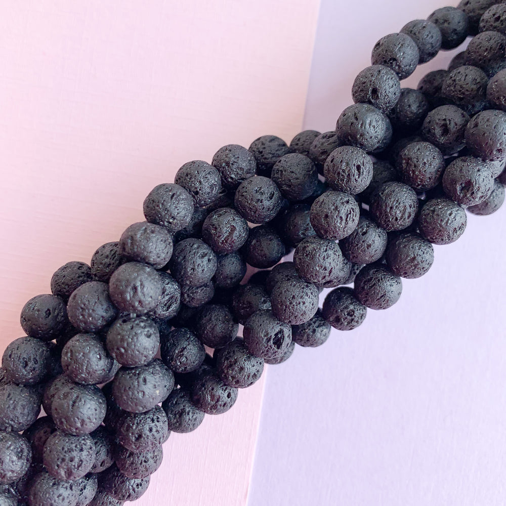 
                
                    Load image into Gallery viewer, 6mm Black Lava Rounds Strand - Beads, Inc.
                
            