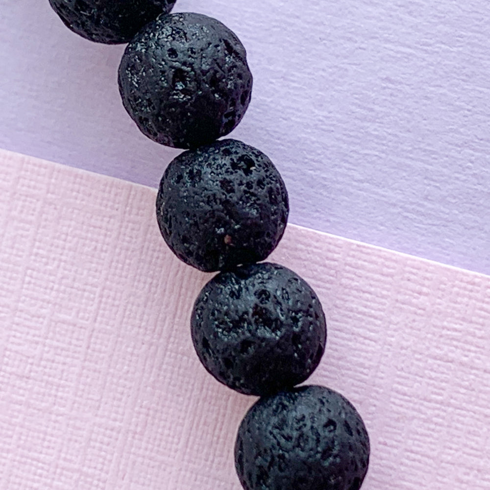 
                
                    Load image into Gallery viewer, 6mm Black Lava Rounds Strand - Beads, Inc.
                
            