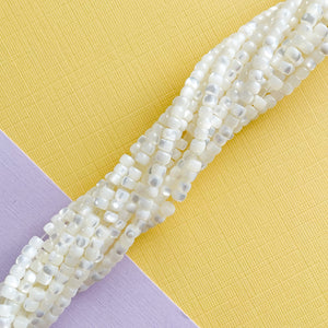 
                
                    Load image into Gallery viewer, 4mm White Mother of Pearl Heishi Strand
                
            